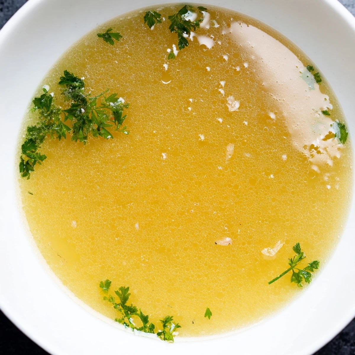 Steaming bowl of Viral Onion Boil, a fragrant and comforting broth, perfect for a chilly evening.