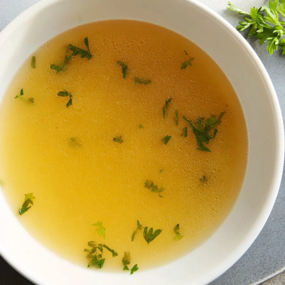 Golden, glistening Viral Onion Boil with soft onions, a simple yet flavor-packed soup ready to enjoy.