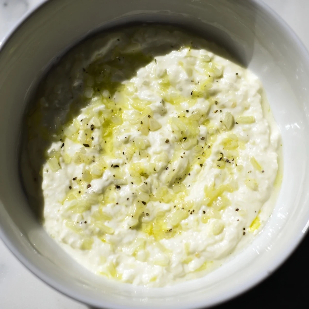 Freshly made garlic sauce, a Mediterranean delight, perfect as a dip with fresh vegetables.