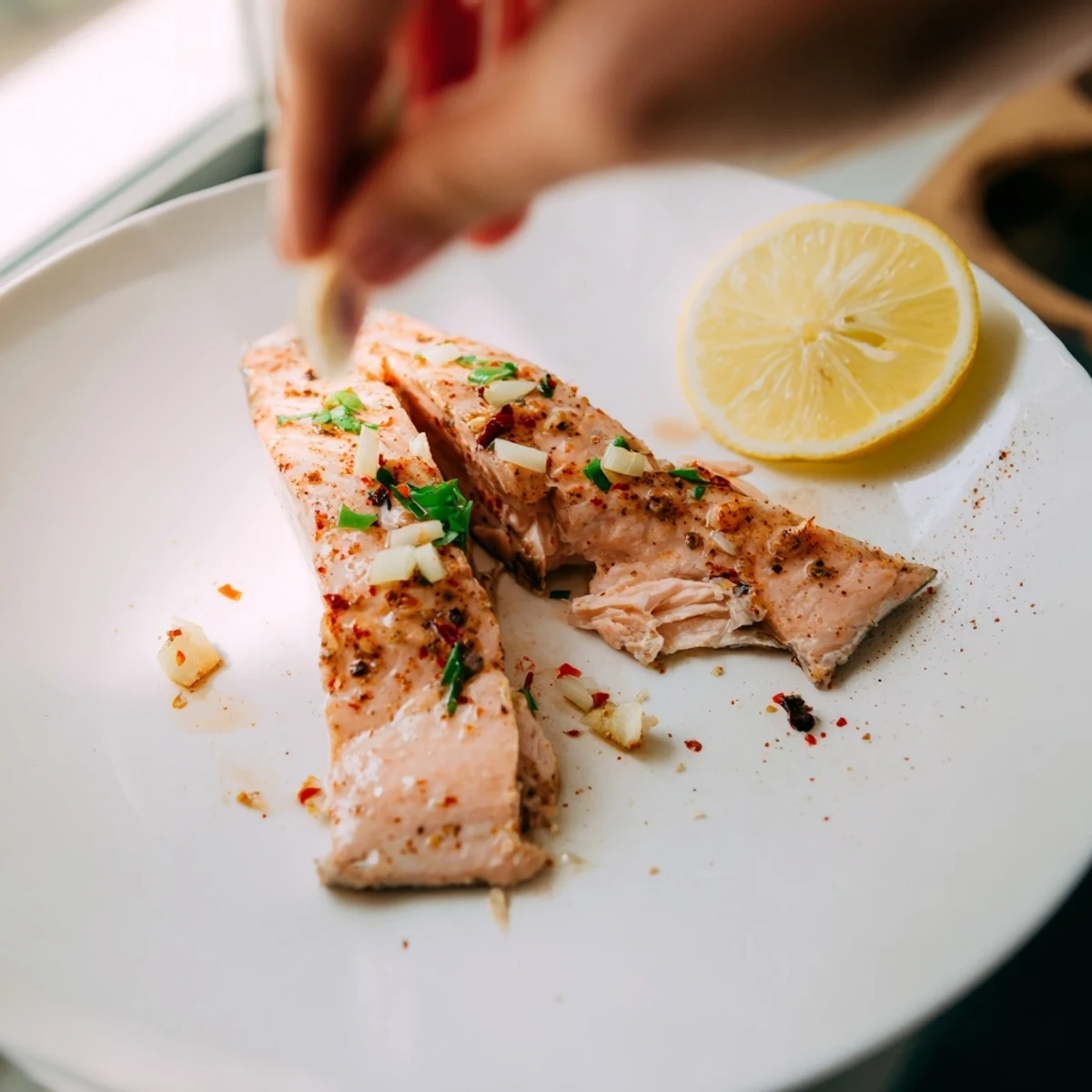 Juicy Baked Salmon with Honey Garlic Glaze, perfectly cooked and glistening on the plate, ready to enjoy.