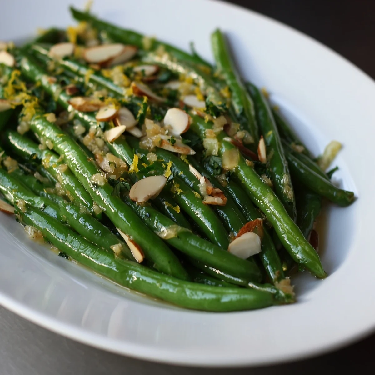 Tender-crisp Lemon Garlic Green Beans, coated in olive oil and garlic for dinner.