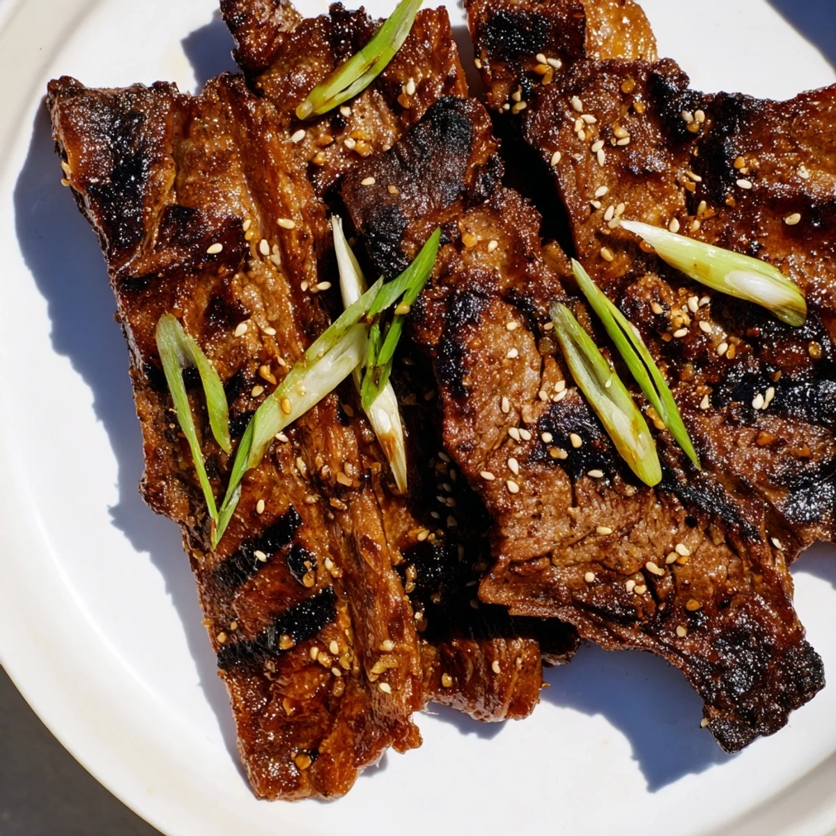 Tender beef short ribs marinated in sweet savory sauce grilled to smoky perfection on the barbecue