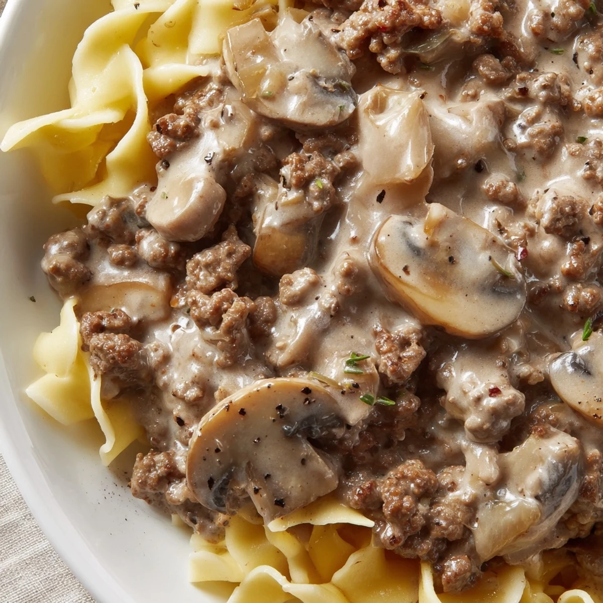 Homemade hamburger stroganoff with tender noodles featuring savory beef and creamy sauce