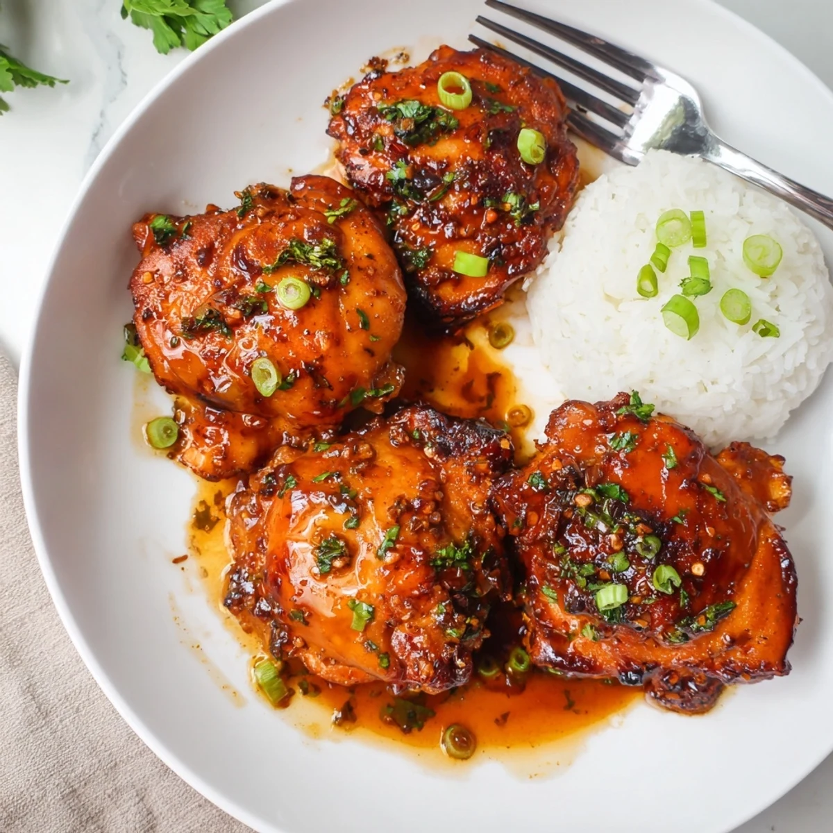 Pan-seared Sweet And Sticky Honey Butter Chicken Thighs, sticky glaze shining, ready to serve