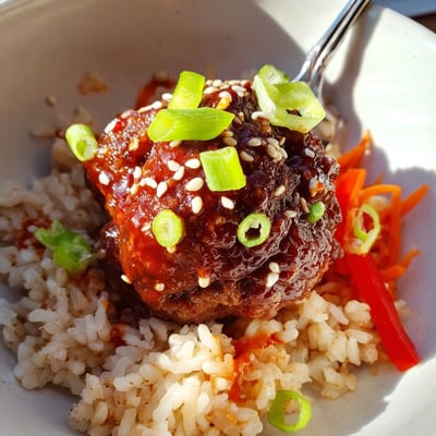 Baked Hello Fresh Firecracker Meatballs tossed with sesame scallions, served with crisp vegetables